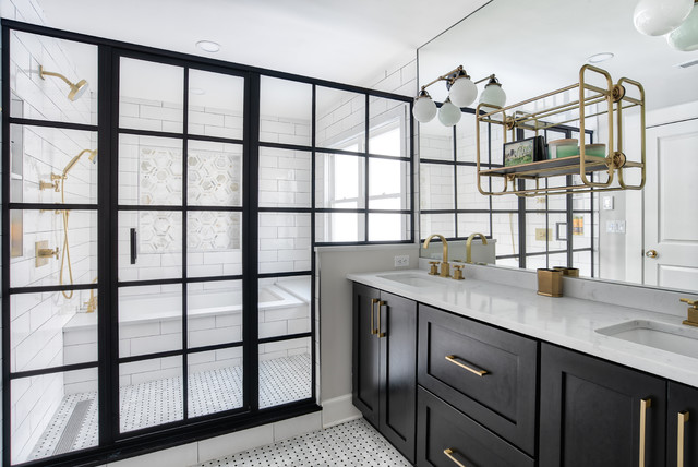 modern bathroom with espresso shaker cabinets, brass hardware, white tile and brass sconces