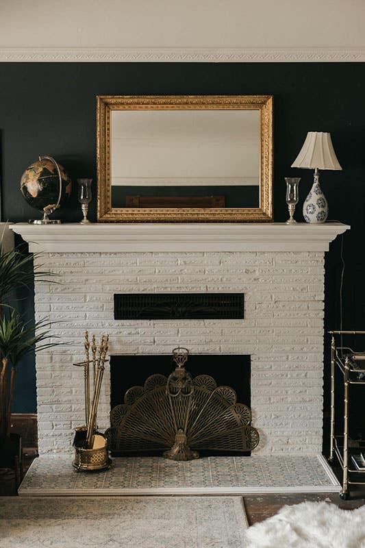 white fireplace with the artistic element