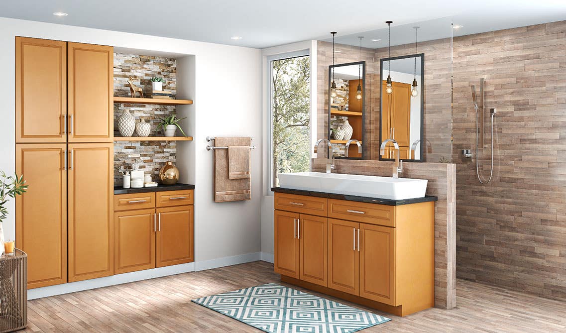 natural wood vanity with stark white shower tile, countertop, and marble tile flooring