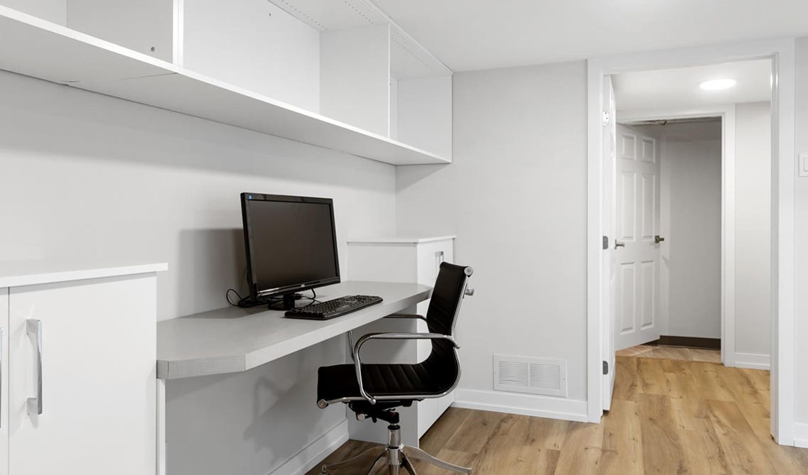 White theme Basement with office desk.