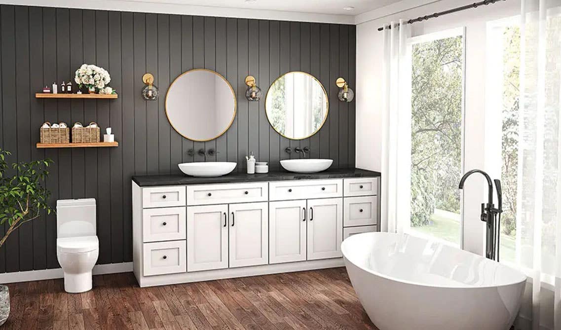 Modern bathroom design with white cabinets, black shiplap wall, floating shelves, free standing bathtub and spc flooring 