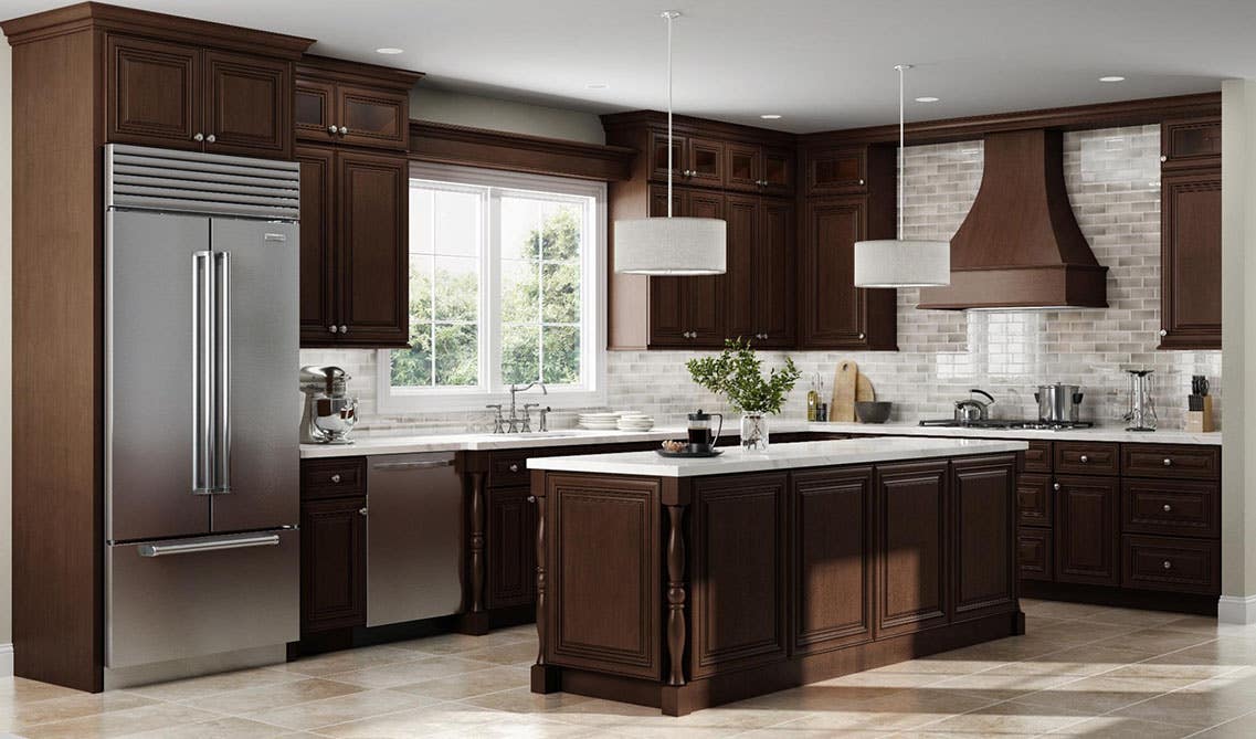 Patterned tiles backsplash with brown cabinets