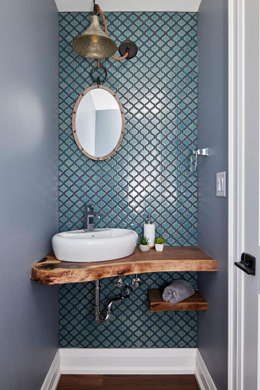 Powder Room with Unique Sink Bowl and wooden shelves 