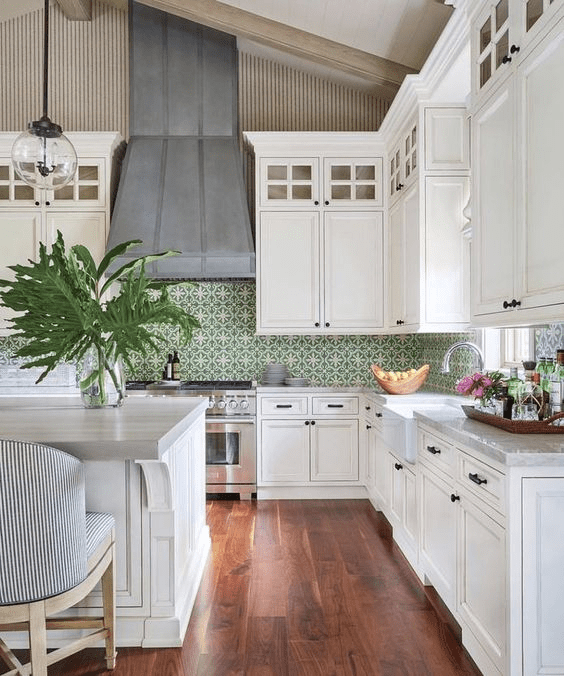 Green Tile Backsplash with White cabinets and large island