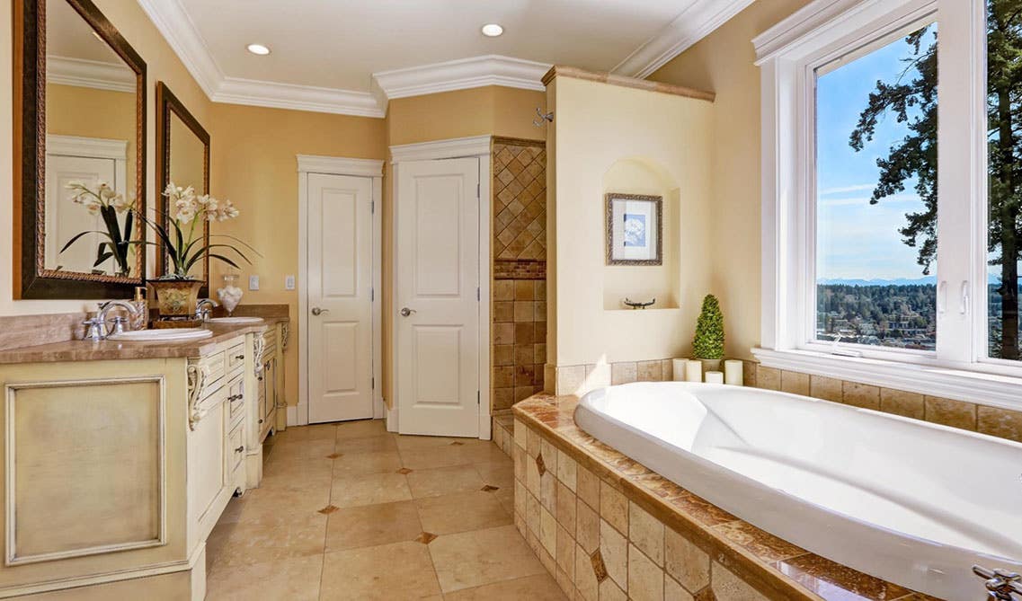 Natural tone Bathroom design with beige vanity and marble floor tile