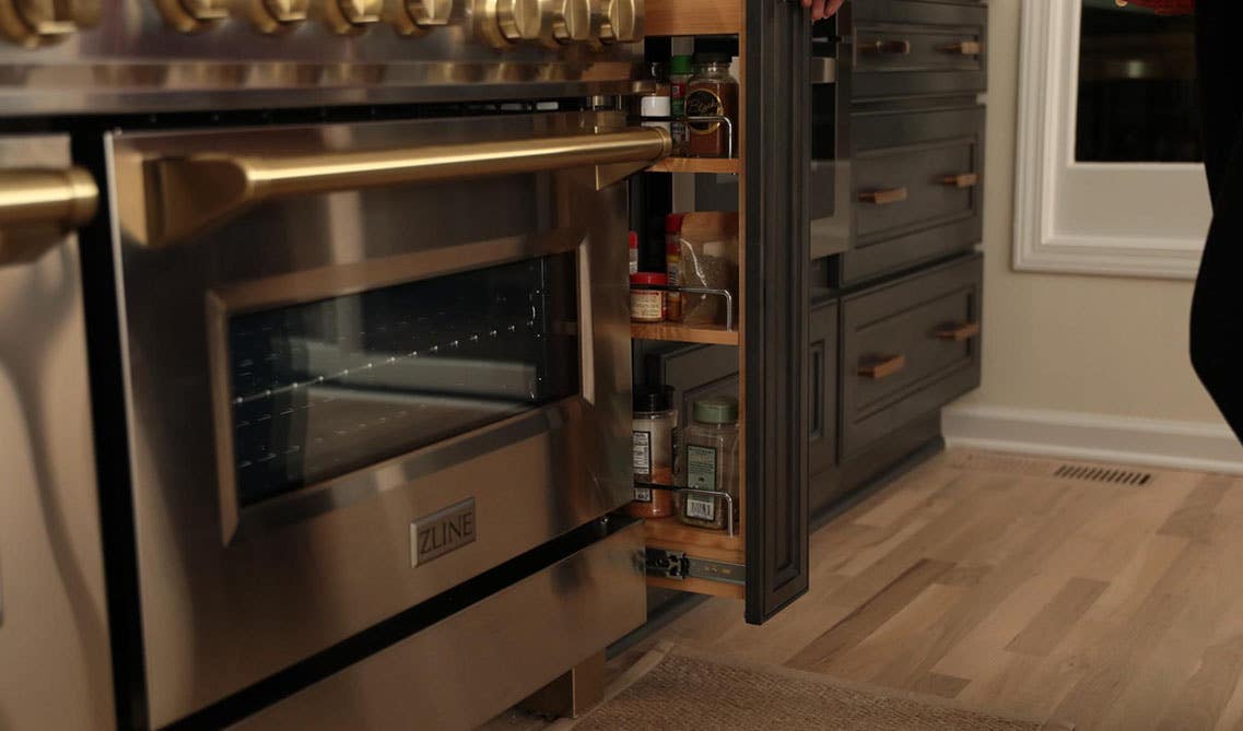 Spice rack Cabinet Organizer beside the kitchen stove