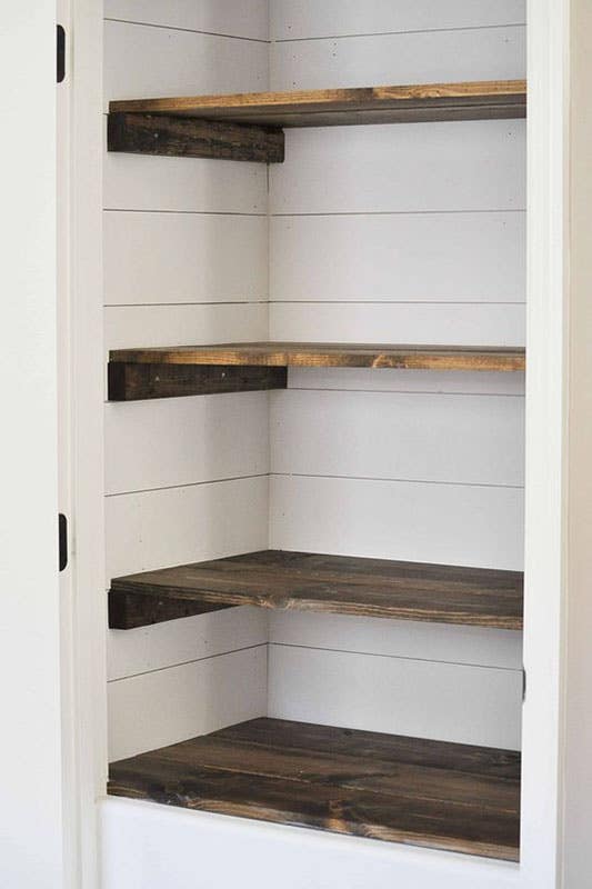 Walk In Pantry with Stained Wood Pantry Shelves 