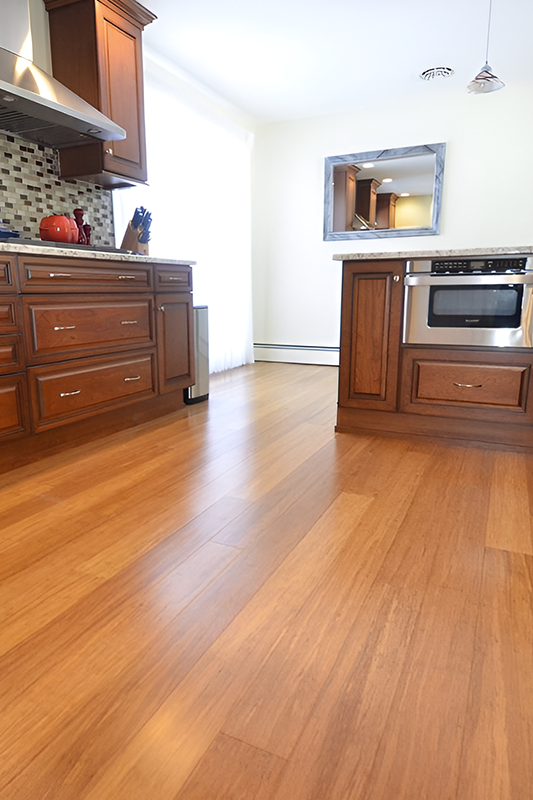 Wooden cabinets paired with Sustainable Flooring