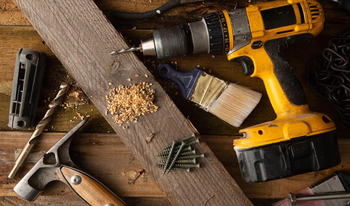 Screwdriver, Paintbrush, hammer- tools for painting kitchen cabinets