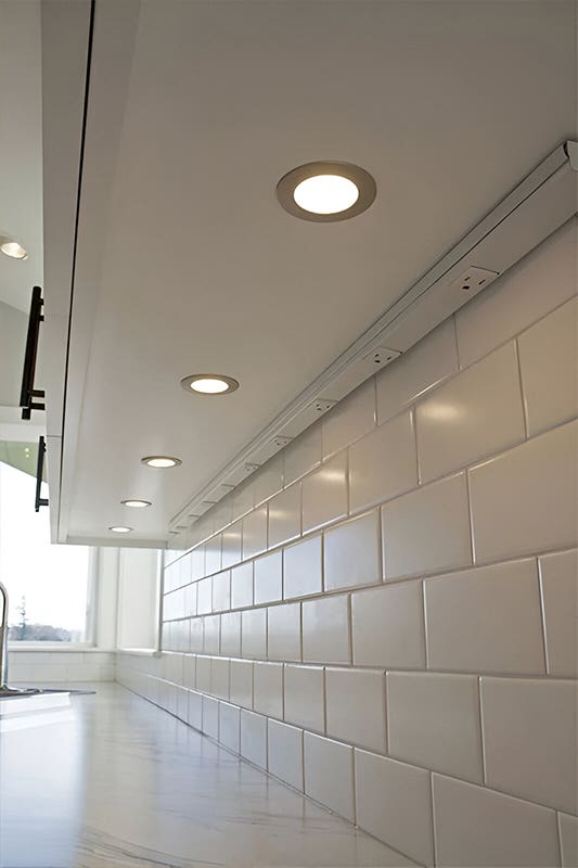 Undercover outlets in white cabinets