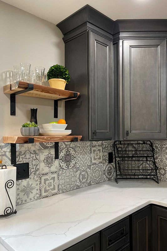 stunning dark gray cabinets with white countertops and some floating shelves decor