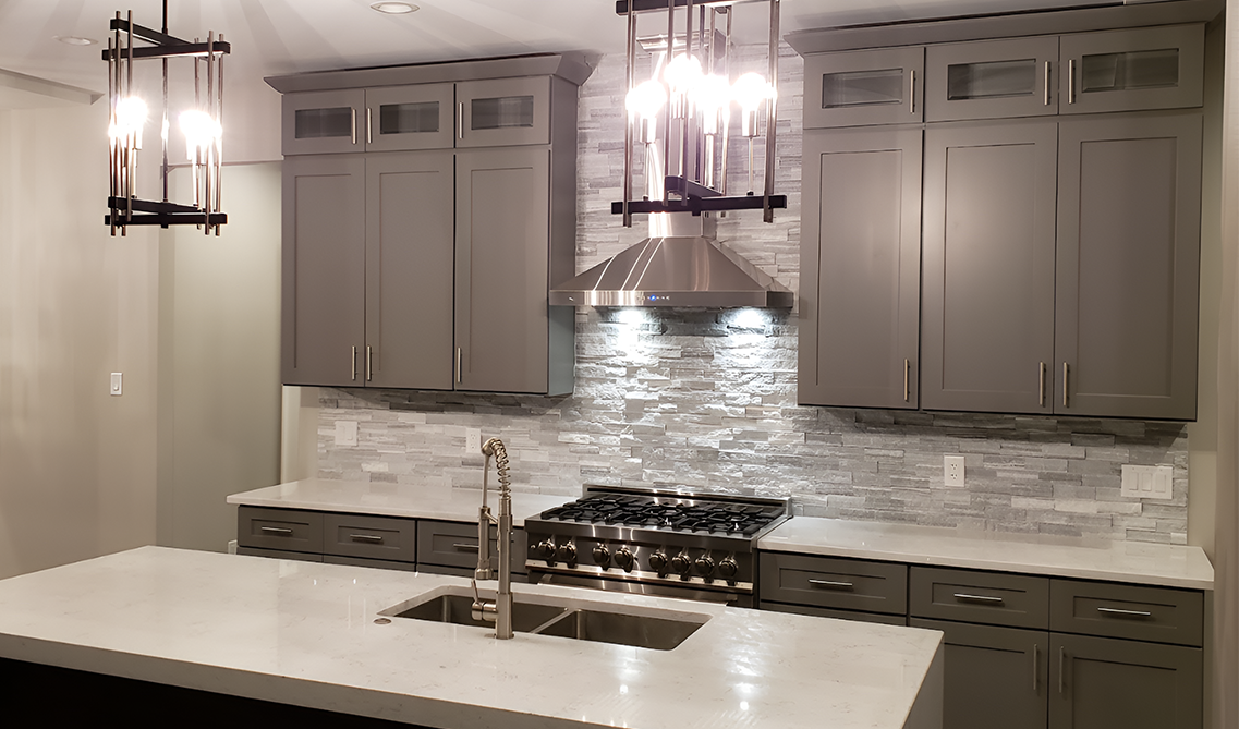 Gray Wall Cabinets paired with silver pulls
