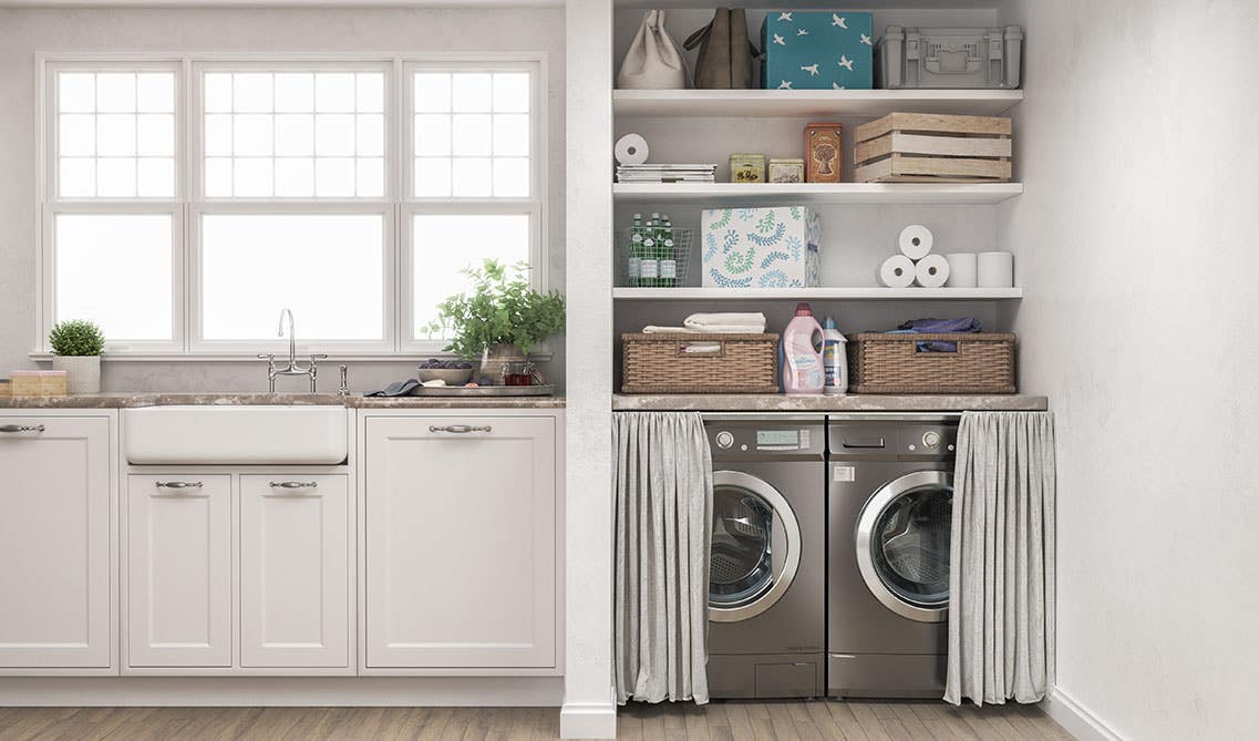 Laundry Room with open shelves, built-in sink, washer and dryer and large window