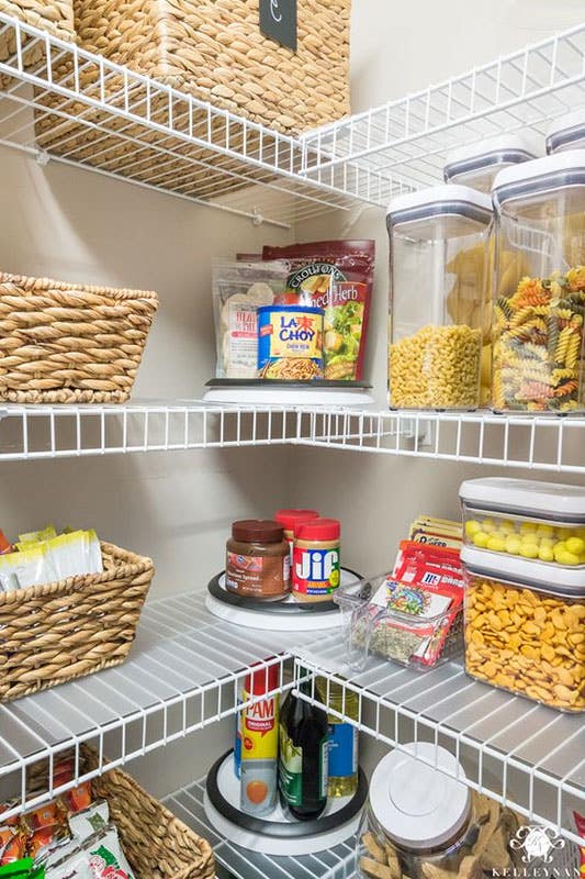 Small Walk In Pantry with White Metal Wire Shelves stored with groceries