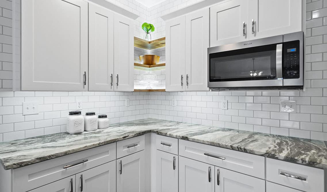 White Shaker Elite Cabinets with Quartz Countertop and Subway Tile Backsplash 