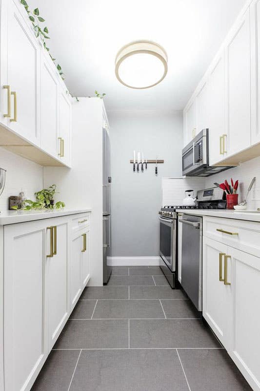 White bright galley kitchen 