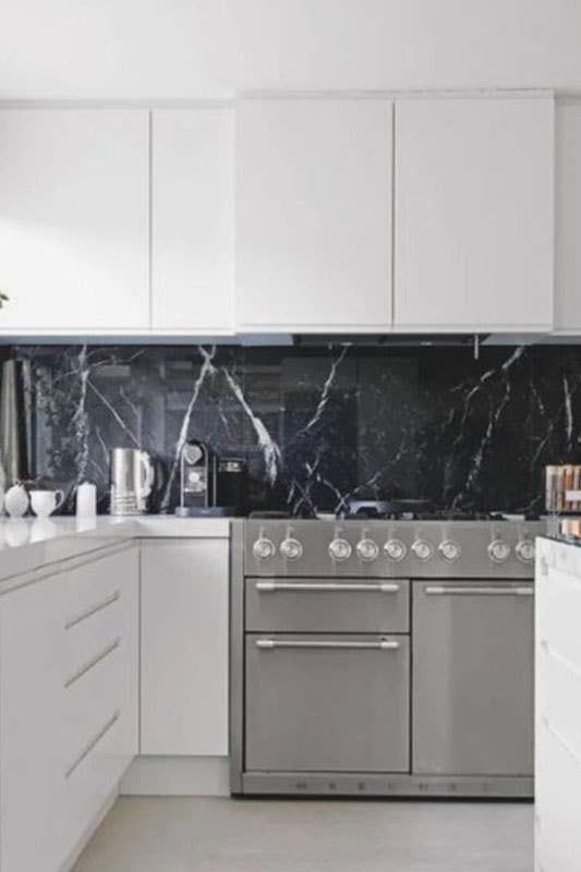 Contemporary kitchen with Black Marble