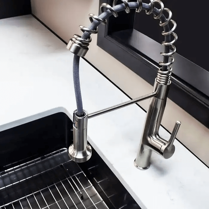 Sink with stainless steel faucets