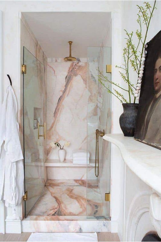 Bathroom shower design with marble slab