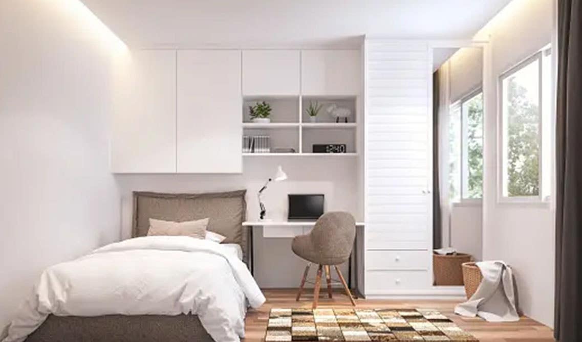 bedroom design with white storage cabinets