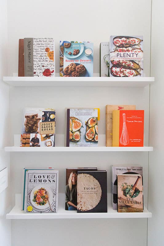 cookbook wall with open shelves 