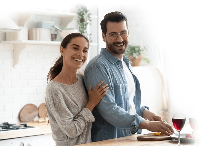 A man and women enjoying their time in kitchen