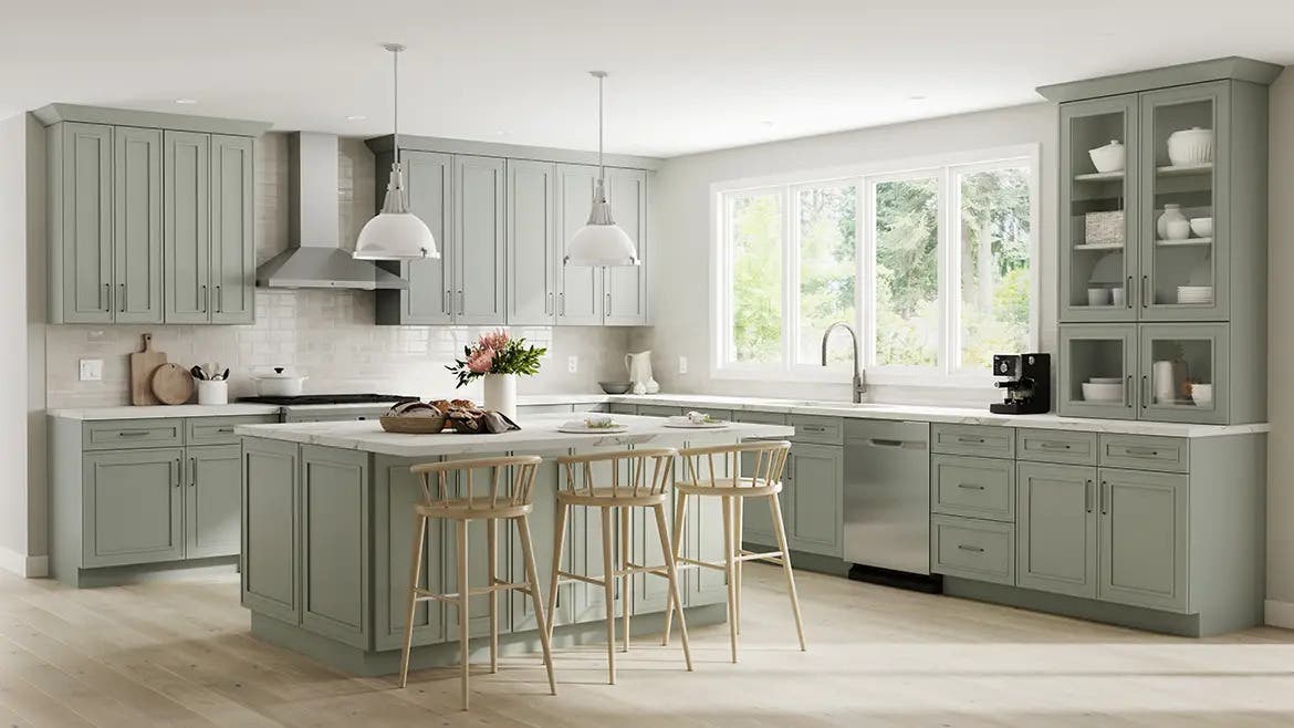 Kitchen with green cabinets with white countertop