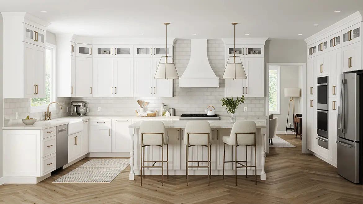 Kitchen with craftsman white shaker cabinets and gold pulls