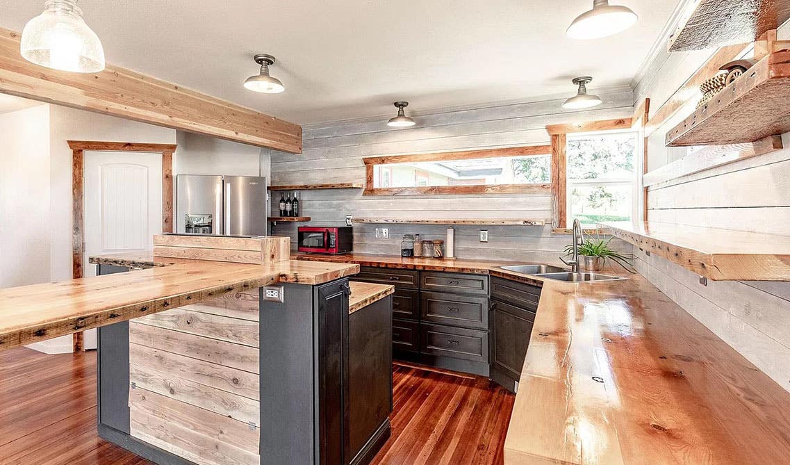 York Driftwood Grey cabinets with wood countertops and island, floating shelves 