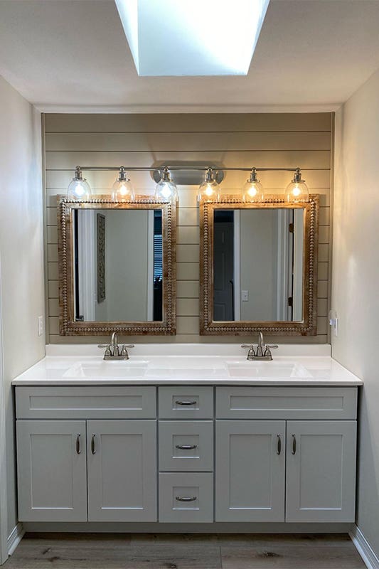 Double bathroom vanity paired with silver hardware