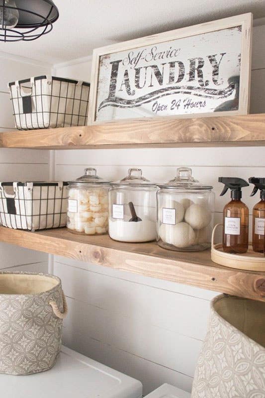 laundry room with Wooden shelving for storage