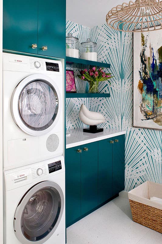 Colorful Laundry room with funky Wallpaper and wall art