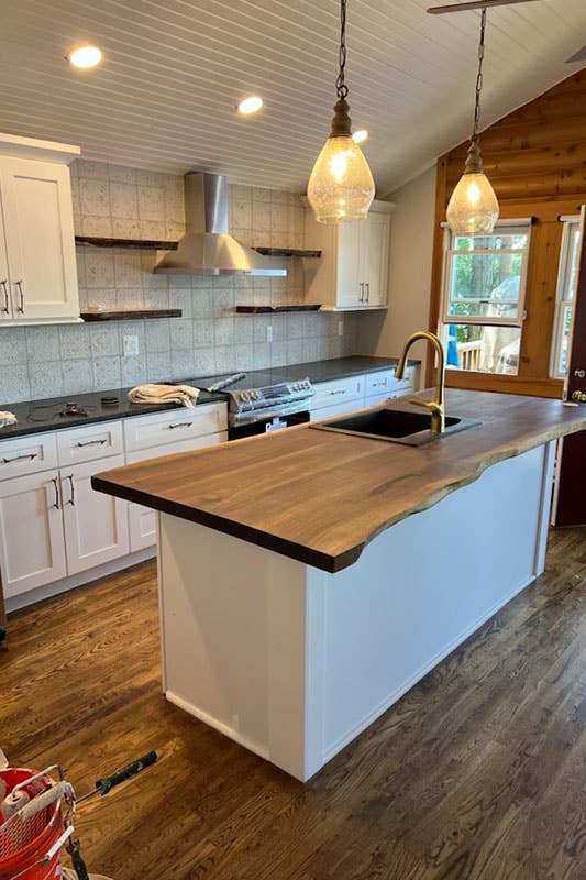 Slab Wood countertops with white cabinets