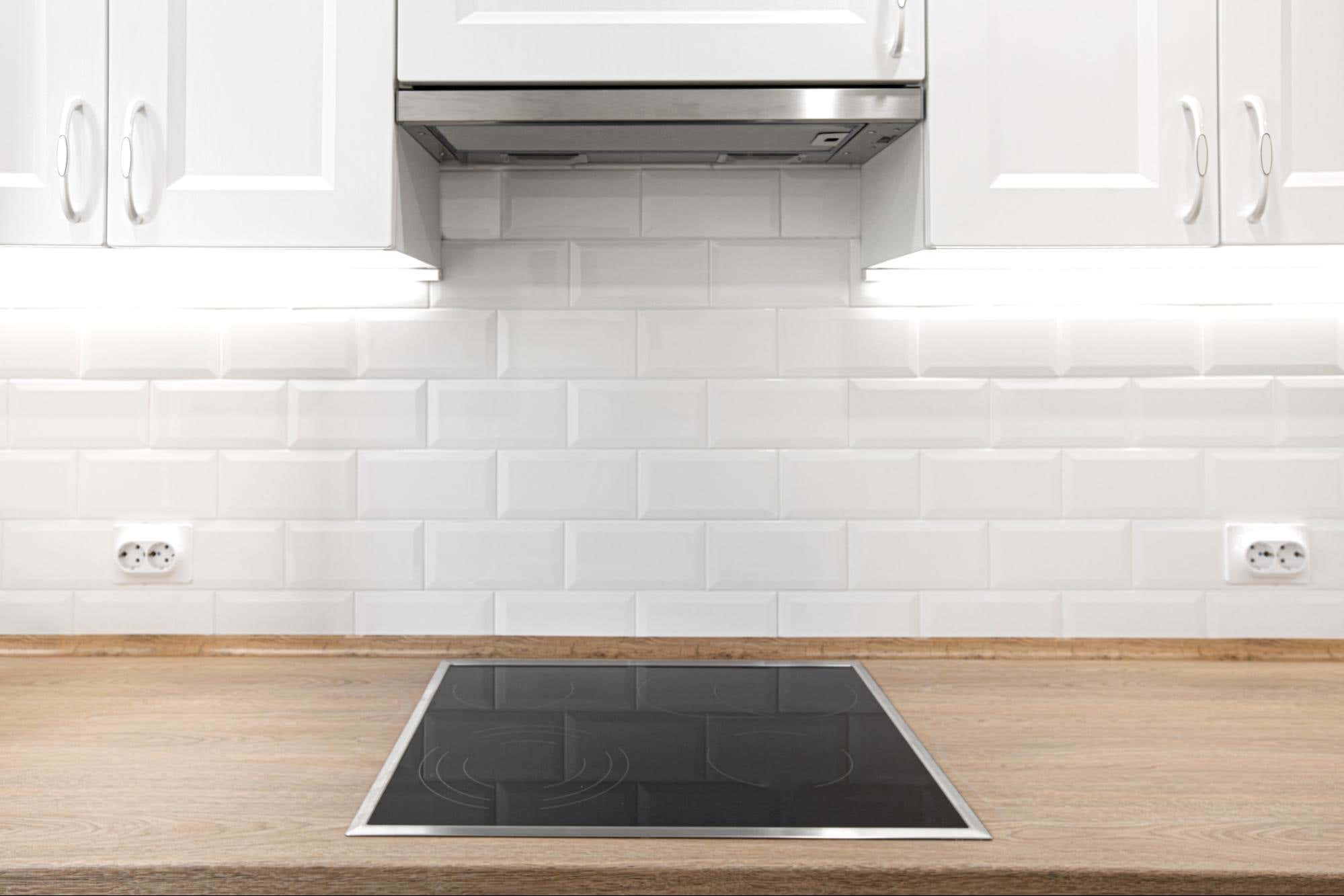 Add a backsplash behind your cooktop