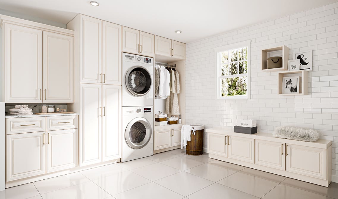 Mudroom and laundry room design with cabinets and side bench, floating shelves on wall 