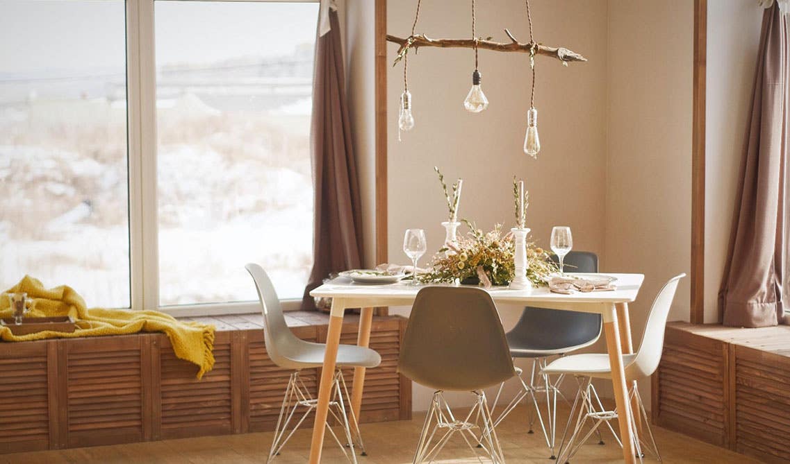 Dining area with unique pendant lights